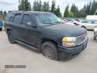 2002 GMC Yukon Denali z VIN 1GKEK63U62J266867, wystawiony jako IAAI lot #42200617 z przebiegiem 232 248 mil mil oraz . Historia ofert i sprzedaży dostępna na DreamBid. Obrazek 1.