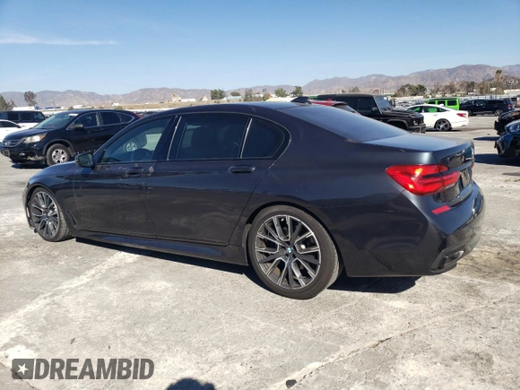 2019 BMW 7 Series 750i with VIN WBA7F0C56KGM25430, listed as a Copart auction lot 42048135 with 74,717 mi miles and Salvage title. Bid and sale history available at DreamBid. Image 2.
