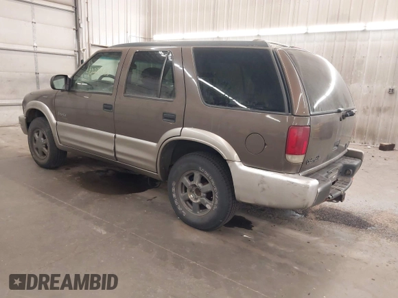 2001 Oldsmobile Bravada z VIN 1GHDT13W812133670, wystawiony jako IAAI lot #42224085 z przebiegiem 159 995 mil mil oraz . Historia ofert i sprzedaży dostępna na DreamBid. Obrazek 3.