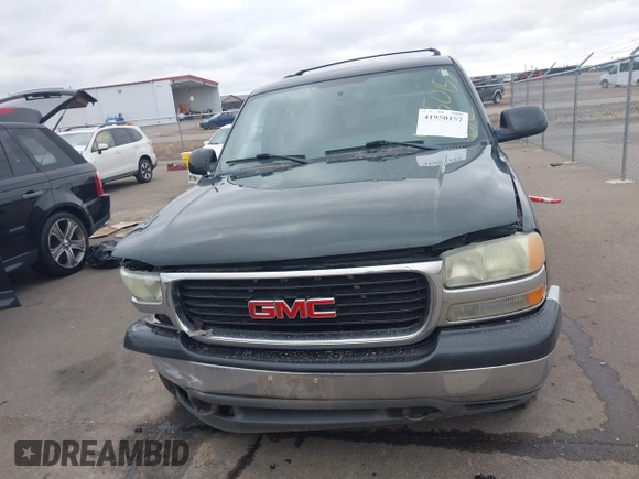 2004 GMC Yukon SLT with VIN 1GKEK13Z24J113954, listed as a IAAI auction lot 41950157 with 174,021 mi miles. Bid and sale history available at carsss.com. Image 13.