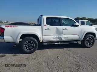 2018 Toyota Tacoma SR with VIN 5TFAX5GN2JX128621, listed as a IAAI auction lot 41797514 with 216,251 mi miles and . Bid and sale history available at DreamBid. Image 6.