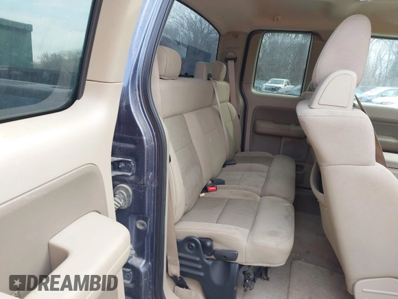 2005 Ford F-150 XLT with VIN 1FTPX14555FA52444, listed as a IAAI auction lot 41604545 with 209,297 mi miles. Bid and sale history available at carsss.com. Image 8.