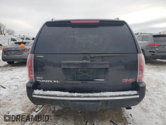 2010 GMC Yukon XL z VIN 1GKUCMEF0AR249218, wystawiony jako Copart lot #88347805 z przebiegiem Nie podano mil oraz Szkoda całkowita • Salvage title. Historia ofert i sprzedaży dostępna na DreamBid. Obrazek 6.