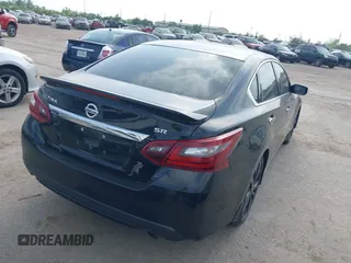 2017 Nissan Altima SR with VIN 1N4AL3AP0HC217024, listed as a IAAI auction lot 41729879 with 127,385 mi miles and . Bid and sale history available at carsss.com. Image 4.