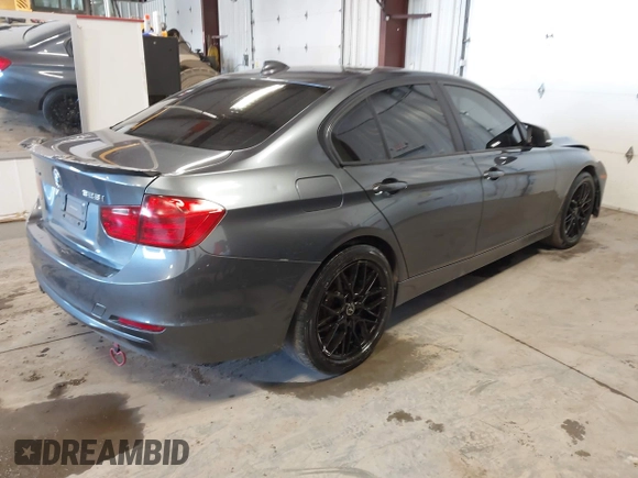 2015 BMW 3 Series 328i xDrive with VIN WBA3B5G53FNS17413, listed as a IAAI auction lot 41643479 with 99,065 mi miles. Bid and sale history available at carsss.com. Image 4.