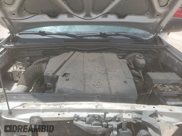 2007 Toyota Tacoma PreRunner z VIN 3TMJU62NX7M048827, wystawiony jako Copart lot #54663895 z przebiegiem 186 921 mil mil oraz Szkoda całkowita • Salvage title. Historia ofert i sprzedaży dostępna na DreamBid. Obrazek 11.