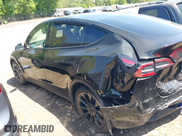 2022 Tesla Model Y Long Range z VIN 7SAYGDEE4NA006645, wystawiony jako IAAI lot #42192495 z przebiegiem 28 784 mil mil oraz . Historia ofert i sprzedaży dostępna na DreamBid. Obrazek 14.
