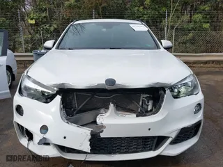 2018 BMW X1 sDrive28i with VIN WBXHU7C39J3H43185, listed as a IAAI auction lot 41798183 with 51,666 mi miles. Bid and sale history available at carsss.com. Image 12.