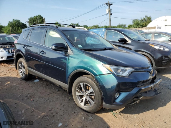 2018 Toyota RAV4 XLE with VIN JTMRFREV0JJ245276, listed as a Copart auction lot 39479404 with 76,837 mi miles and Clean Title. Bid and sale history available at carsss.com. Image 4.