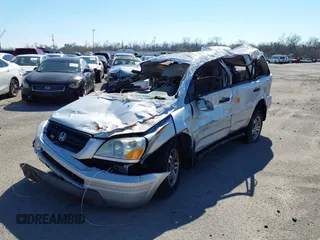 2005 Honda Pilot EX with VIN 5FNYF18405B063686, listed as a IAAI auction lot 39906381 with 241,904 mi miles. Bid and sale history available at carsss.com. Image 2.