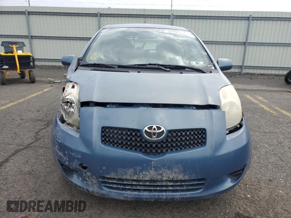 2007 Toyota Yaris with VIN JTDJT923475083016, listed as a Copart auction lot 52903115 with 127,280 mi miles and Salvage Title. Bid and sale history available at carsss.com. Image 5.