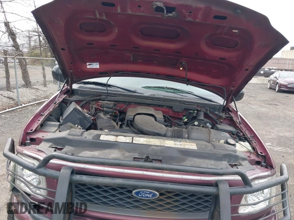 1998 Ford F-150 XL with VIN 1FTDX18W9WKA01690, listed as a IAAI auction lot 41944734 with 176,359 mi miles. Bid and sale history available at carsss.com. Image 10.
