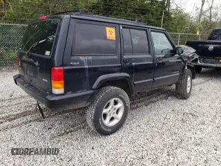 2001 Jeep Cherokee Sport с VIN 1J4FF48S31L615450, выставлен на аукционе Copart как лот 55835585 с пробегом 246 694 миль миль и Списание • Salvage title. История ставок и продаж доступна на DreamBid. Изображение 3.