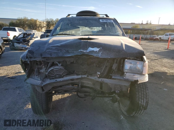1998 Jeep Grand Cherokee Laredo with VIN 1J4FX58S4WC102623, listed as a Copart auction lot 86188764 with 283,210 mi miles and Salvage Title. Bid and sale history available at carsss.com. Image 5.