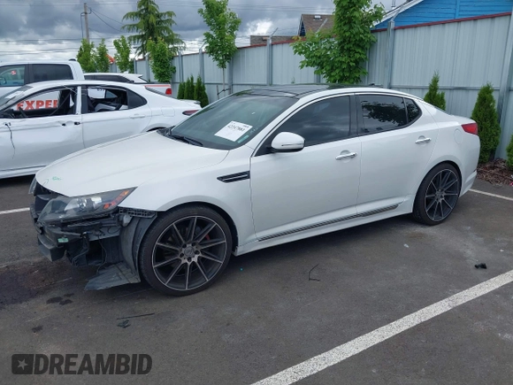2013 Kia Optima SX with VIN 5XXGR4A63DG192937, listed as a IAAI auction lot 42247881 with 114,837 mi miles and . Bid and sale history available at DreamBid. Image 2.