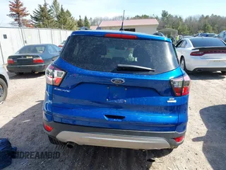 2017 Ford Escape SE z VIN 1FMCU0G95HUB75348, wystawiony jako IAAI lot #41790288 z przebiegiem 55 129 mil mil oraz . Historia ofert i sprzedaży dostępna na DreamBid. Obrazek 16.