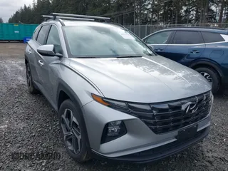 2022 Hyundai Tucson SEL z VIN 5NMJC3AE0NH014592, wystawiony jako IAAI lot #41513700 z przebiegiem 24 295 mil mil oraz . Historia ofert i sprzedaży dostępna na DreamBid. Obrazek 1.