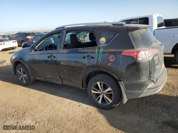 2016 Toyota RAV4 XLE with VIN 2T3RFREV5GW429025, listed as a Copart auction lot 52504165 with 138,249 mi miles and Salvage Title. Bid and sale history available at carsss.com. Image 2.