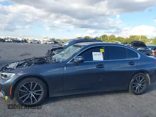 2021 BMW 3 Series 330i xDrive with VIN 3MW5R7J01M8B49173, listed as a IAAI auction lot 41672538 with 82,259 mi miles and . Bid and sale history available at carsss.com. Image 14.
