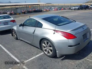 2003 Nissan 350Z Touring with VIN JN1AZ34E43T010781, listed as a IAAI auction lot 42164130 with 181,016 mi miles. Bid and sale history available at carsss.com. Image 3.