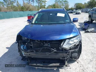 2017 Nissan Rogue SL with VIN JN8AT2MT6HW139347, listed as a IAAI auction lot 41771728 with 215,809 mi miles and . Bid and sale history available at DreamBid. Image 13.