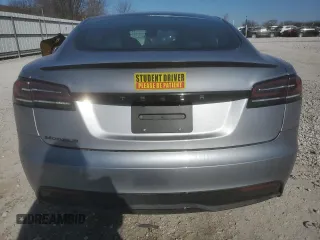 2024 Tesla Model S с VIN 5YJSA1E56RF541102, выставлен на аукционе Copart как лот 42584275 с пробегом Не указан миль и Списание • Salvage title. История ставок и продаж доступна на DreamBid. Изображение 6.