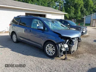 2014 Toyota Sienna XLE with VIN 5TDYK3DCXES524294, listed as a IAAI auction lot 42546467 with 122,257 mi miles and . Bid and sale history available at DreamBid. Image 1.