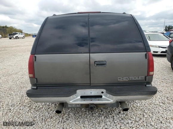 1999 Chevrolet Tahoe with VIN 1GNEC13R6XR150124, listed as a Copart auction lot 70630524 with 238,990 mi miles and Salvage Title. Bid and sale history available at carsss.com. Image 6.