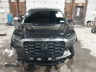 2025 Honda Passport EX-L z VIN 5FNYF8H54SB010454, wystawiony jako IAAI lot #41569333 z przebiegiem 4592 mil mil oraz . Historia ofert i sprzedaży dostępna na DreamBid. Obrazek 12.