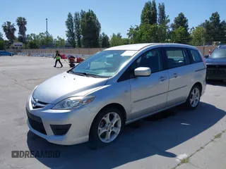 2009 Mazda 5 Touring z VIN JM1CR29L090334702, wystawiony jako IAAI lot #42349375 z przebiegiem 188 173 mil mil oraz . Historia ofert i sprzedaży dostępna na DreamBid. Obrazek 6.