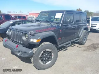 2020 Jeep Wrangler Unlimited Rubicon with VIN 1C4HJXFG0LW108844, listed as a IAAI auction lot 41737307 with 56,959 mi miles. Bid and sale history available at carsss.com. Image 17.