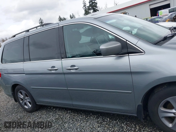 2008 Honda Odyssey Touring with VIN 5FNRL38908B098771, listed as a IAAI auction lot 41878646 with 167,834 mi miles. Bid and sale history available at carsss.com. Image 13.