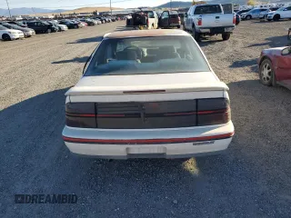 1990 Chevrolet Beretta z VIN 1G1LW14T1LE136918, wystawiony jako Copart lot #72023874 z przebiegiem 71 009 mil mil oraz Czysty tytuł • Clean title. Historia ofert i sprzedaży dostępna na DreamBid. Obrazek 6.
