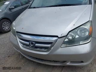 2005 Honda Odyssey EX-L with VIN 5FNRL38785B000287, listed as a IAAI auction lot 42093706 with 214,645 mi miles. Bid and sale history available at carsss.com. Image 6.