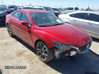 2017 Mazda 6 Grand Touring with VIN JM1GL1W52H1139776, listed as a IAAI auction lot 41671005 with 40,884 mi miles and . Bid and sale history available at DreamBid. Image 1.