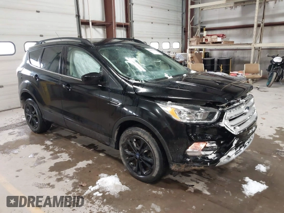 2018 Ford Escape SE with VIN 1FMCU9GD7JUD36295, listed as a IAAI auction lot 41855037 with 85,305 mi miles. Bid and sale history available at carsss.com. Image 1.