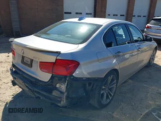 2017 BMW 3 Series 330i xDrive with VIN WBA8D9G54HNU60951, listed as a IAAI auction lot 41634617 with 76,892 mi miles. Bid and sale history available at carsss.com. Image 4.