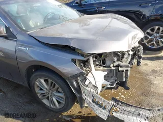 2015 Toyota Camry Hybrid LE with VIN 4T1BD1FK5FU164384, listed as a IAAI auction lot 41704922 with 122,132 mi miles. Bid and sale history available at carsss.com. Image 17.