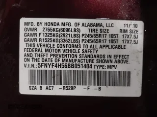 2011 Honda Pilot EX-L with VIN 5FNYF4H56BB051404, listed as a IAAI auction lot 41758332 with 301,099 mi miles. Bid and sale history available at carsss.com. Image 9.