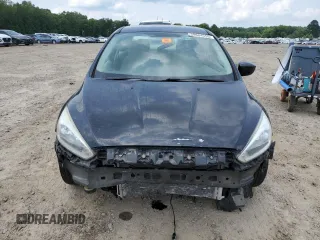 2018 Ford Focus SE z VIN 1FADP3F28JL319269, wystawiony jako Copart lot #59604555 z przebiegiem 167 726 mil mil oraz Szkoda całkowita • Salvage title. Historia ofert i sprzedaży dostępna na DreamBid. Obrazek 5.