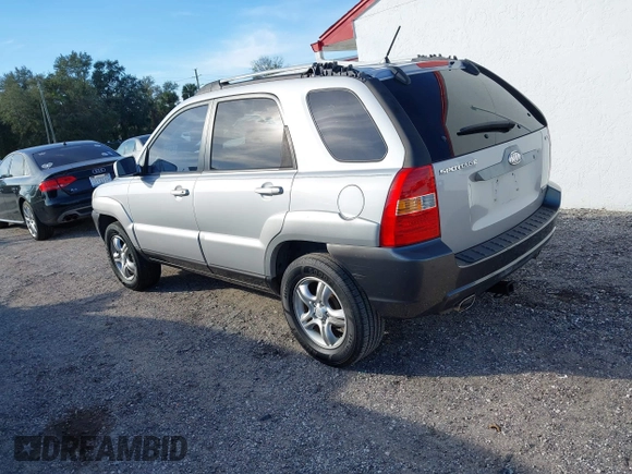 2005 Kia Sportage LX z VIN KNDJF723X57077945, wystawiony jako IAAI lot #41431249 z przebiegiem 145 334 mil mil oraz . Historia ofert i sprzedaży dostępna na DreamBid. Obrazek 3.