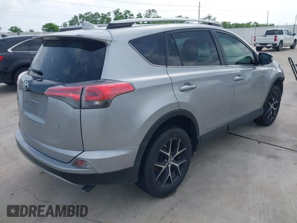 2018 Toyota RAV4 SE with VIN 2T3NFREV9JW424156, listed as a IAAI auction lot 42110768 with 80,376 mi miles and . Bid and sale history available at DreamBid. Image 4.