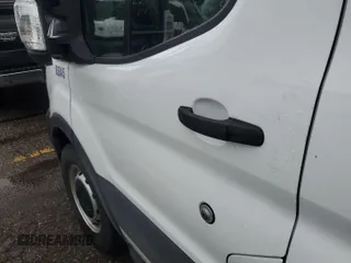 2021 Ford Transit Cargo with VIN 1FTBR1Y82MKA76523, listed as a IAAI auction lot 42679221 with 39,449 mi miles and . Bid and sale history available at DreamBid. Image 16.