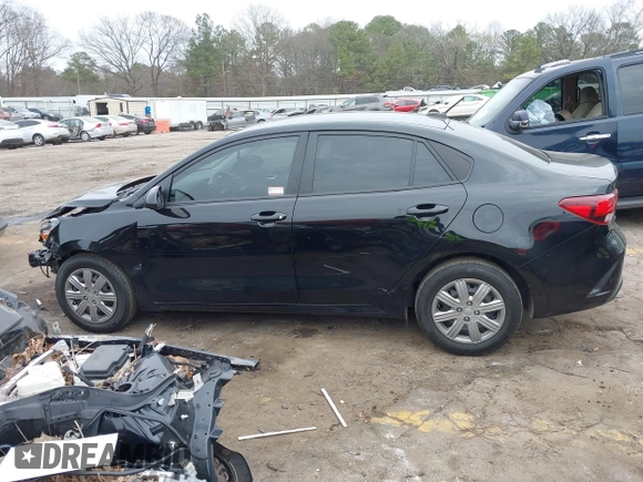 2023 Kia Rio S with VIN 3KPA24AD5PE560704, listed as a IAAI auction lot 41546929 with 51,114 mi miles. Bid and sale history available at carsss.com. Image 14.