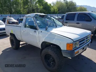 1987 Toyota Pickup z VIN JT4RN63R0H5030636, wystawiony jako IAAI lot #42335709 z przebiegiem 199 999 mil mil oraz . Historia ofert i sprzedaży dostępna na DreamBid. Obrazek 1.