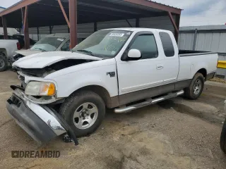 2002 Ford F-150 XL with VIN 1FTRX17WX2KC49979, listed as a Copart auction lot 50528355 with 0 mi miles and Salvage Title. Bid and sale history available at carsss.com. Image 1.