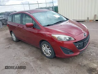 2012 Mazda 5 Sport z VIN JM1CW2BL4C0143780, wystawiony jako IAAI lot #42362211 z przebiegiem 201 537 mil mil oraz . Historia ofert i sprzedaży dostępna na DreamBid. Obrazek 1.