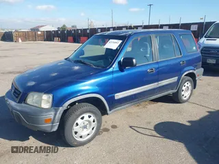 1999 Honda CR-V LX with VIN JHLRD1846XC028583, listed as a IAAI auction lot 42154092 with 200,228 mi miles. Bid and sale history available at carsss.com. Image 2.