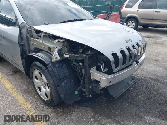 2014 Jeep Cherokee Sport with VIN 1C4PJLAB5EW268916, listed as a IAAI auction lot 41715729 with 116,544 mi miles and . Bid and sale history available at DreamBid. Image 18.