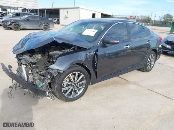 2019 Kia Optima LX with VIN 5XXGT4L3XKG376676, listed as a IAAI auction lot 41679981 with 57,211 mi miles. Bid and sale history available at carsss.com. Image 2.